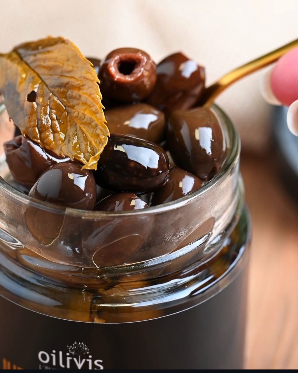 Oilivis PITTED OLIVES WITH SPICES AND AROMATIC PLANTS Image