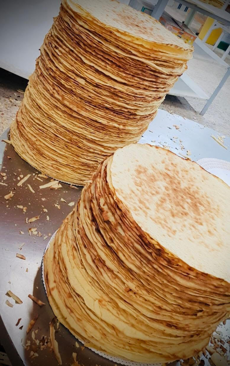 Pane Carasatu – Traditional Thin and crispy, handcrafted in Sardinia following authentic recipes.   Available Variants:  Guttiau seasoned with extra virgin olive oil   Image