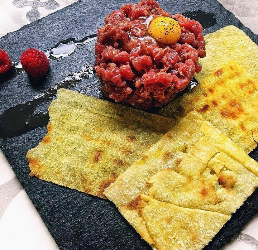 Snack Pane Guttiatu 40g Snack Thin and crispy, handcrafted in Sardinia following authentic recipes. Image